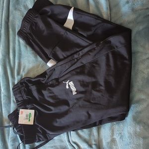 Puma iconic tricot pants black and white . Mense large NWT